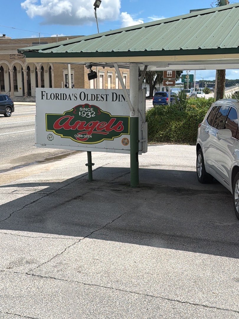 Classic roadside diner with outdoor seating.
