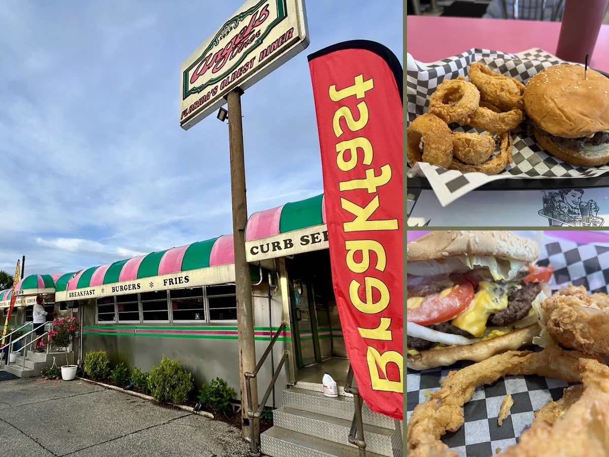 Historic diner with parked cars outside.